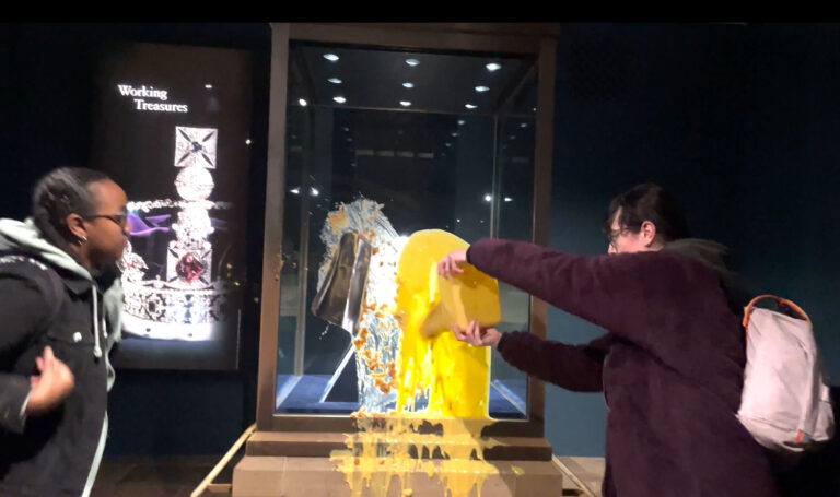 Protesters throw custard over U.K. crown jewels display case, closing the Tower of London