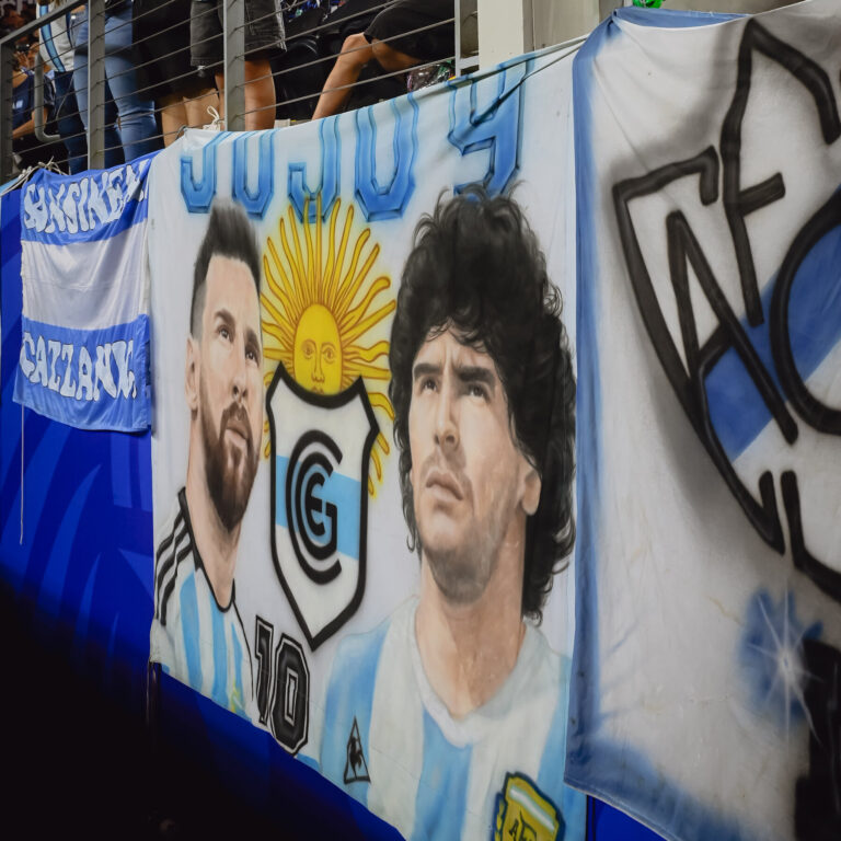 As Messi Dominates the World Cup, a War Is Waged Over Maradona’s Image