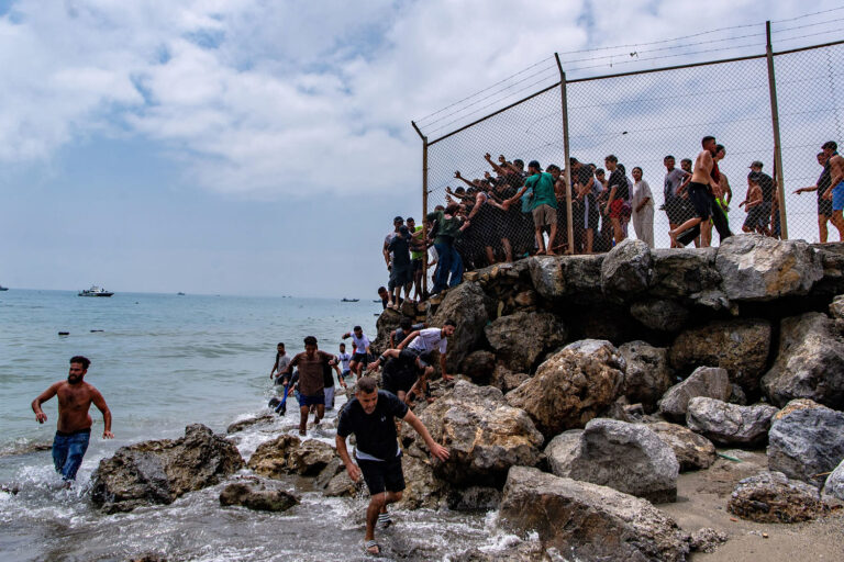 At least 57 bodies recovered after migrants rush into Spanish territory from Morocco
